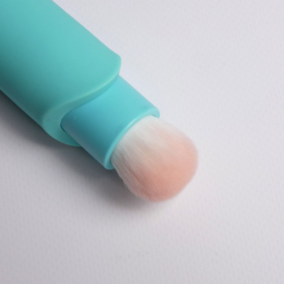 Бирюзовая многофункциональная вибропуля с щеточкой Бирюзовая многофункциональная вибропуля с щеточкой