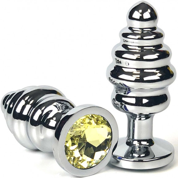 Серебристая ребристая анальная пробка с желтым кристаллом - 8 см. Серебристая ребристая анальная пробка с желтым кристаллом - 8 см.