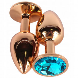 Золотистая гладкая анальная пробка с голубым кристаллом - 6,8 см.