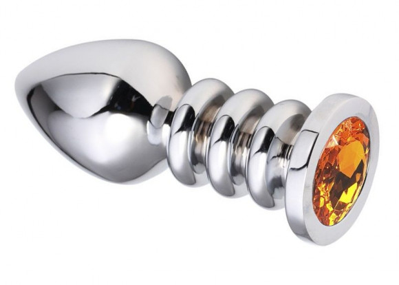 Серебристая анальная пробка на рельефной ножке с оранжевым кристаллом - 9,5 см. Серебристая анальная пробка на рельефной ножке с оранжевым кристаллом - 9,5 см.