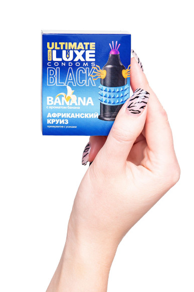 Черный стимулирующий презерватив «Африканский круиз» с ароматом банана - 1 шт. Черный стимулирующий презерватив «Африканский круиз» с ароматом банана - 1 шт.