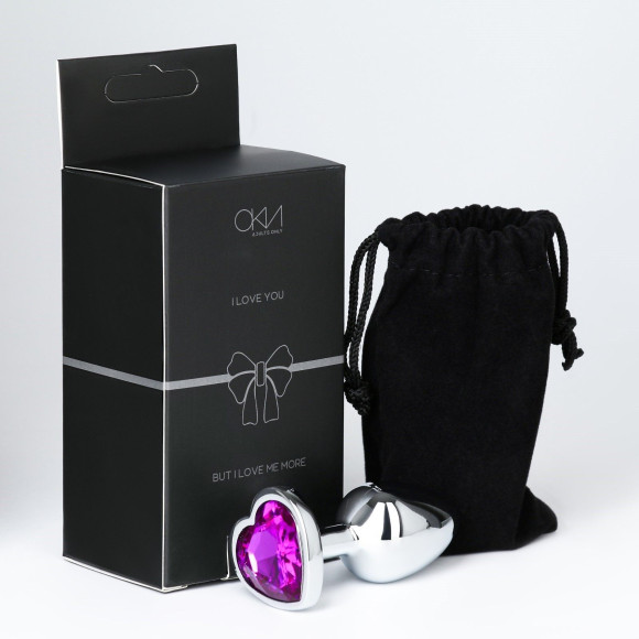 Серебристая анальная пробка с фиолетовым кристаллом в форме сердца - 7 см. Серебристая анальная пробка с фиолетовым кристаллом в форме сердца - 7 см.