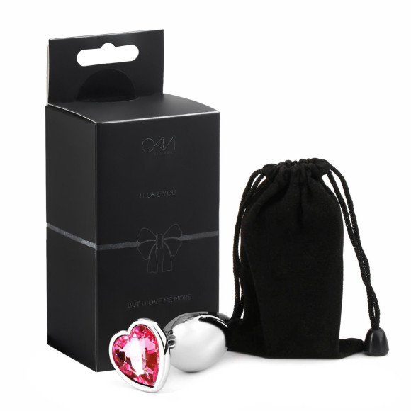 Серебристая анальная пробка с розовым кристаллом в форме сердца - 7 см. Серебристая анальная пробка с розовым кристаллом в форме сердца - 7 см.